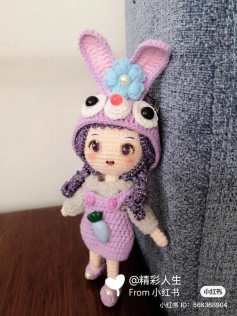 crochet pattern purple hair doll wearing purple rabbit hat,