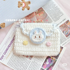 crochet pattern white woolen wallet with rabbit face buckle.