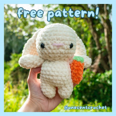 free crochet pattern rabbit with floppy ears, hand holding carrot