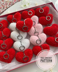 Heart-shaped keychain, white, red.