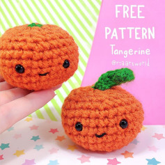 Orange crochet pattern with green leaves