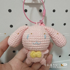 Rabbit wearing yellow bib crochet pattern