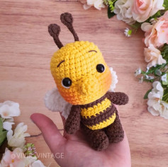 Yellow bee crochet pattern with brown beard.