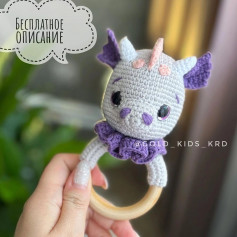 dice, rattle white dragon, purple ears white horns.free crochet pattern