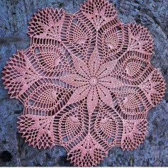 Free crochet circular pattern with eight leaves in the center.eight large leaves on the outside.