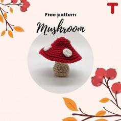 free crochet mushroom pattern with white dots on top of hat.