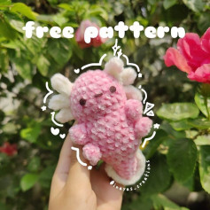 free crochet pattern axolotl pink, horns white.