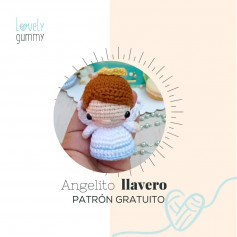 free crochet pattern brown-haired doll with white wings.