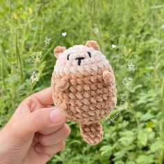 free crochet pattern brown otter, white face.