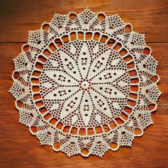 free crochet pattern circle with a circle in the center, in which there are ten leaves.