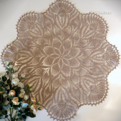 free crochet pattern circular with eight petals, leaves in the center.