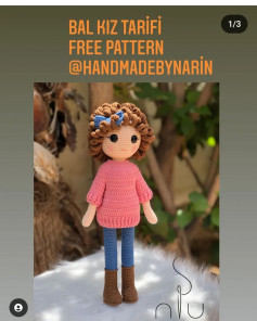 free crochet pattern doll wearing pink shirt, brown hair.