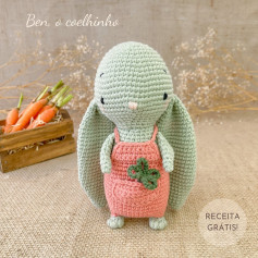 free crochet pattern floppy-eared rabbit wearing pink bib.