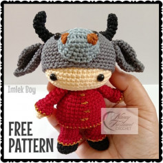 free crochet pattern imlek boy wearing buffalo hat