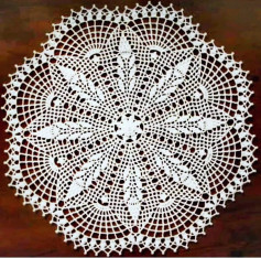 free crochet pattern in a circle with leaves from inside to outside.