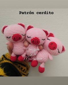 free crochet pattern pink pig with red nose.