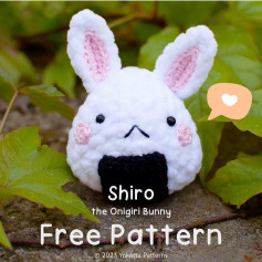 free crochet pattern shiro the onigiri bunny, white rabbit with pink ears, black belly.