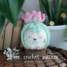 free crochet pattern spherical with pink color on top, sleepy