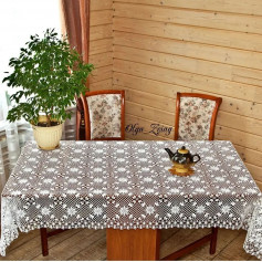 free crochet pattern tablecloth consisting of floral and leaf decoration.