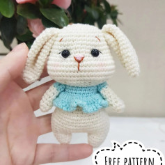 free crochet pattern white rabbit wearing blue shirt.