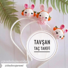 free crochet pattern white rabbit with pink ears wearing orange headphones.
