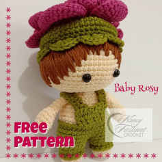 rose doll wears moss green overalls and hat.crochet pattern