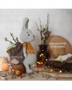 white rabbit wearing yellow crochet pattern