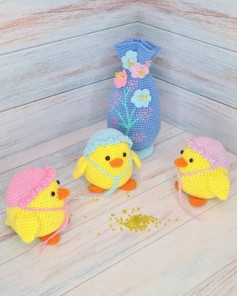 yellow chicks, pink hats, blue hats, purple crochet pattern hats