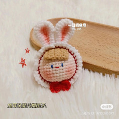 Dolls head wears a rabbit-eared hat, crochet pattern