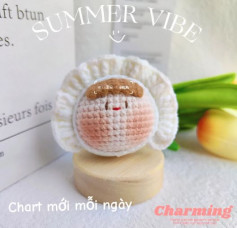 dumpling wearing a white crochet pattern hat