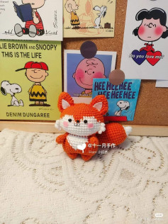 Crochet pattern for a red fox with a white belly