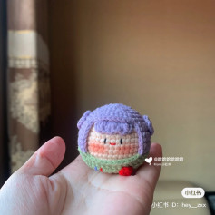 Crochet pattern for purple dumplings for boys, long-haired girls.