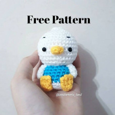 free pattern white duck wearing a blue shirt