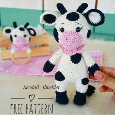 Crochet cow pattern with horns and tail White and black spotted