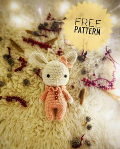 Crochet pattern for a rabbit wearing a bow