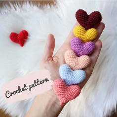 Heart crochet pattern in yellow, brown, purple, pink.