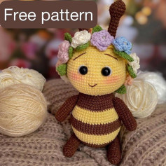 Crochet pattern of a bee wearing a wreath on her head.