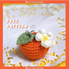 Crochet patterns for orange keychains, flowers and leaves