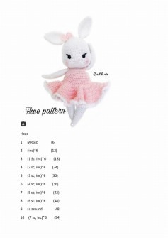 White rabbit crochet pattern wearing pink dress.