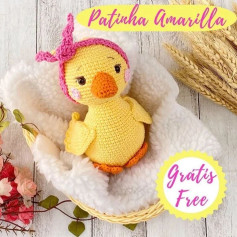 Padrão de crochê para um pato enrolado em uma faixa para a cabeça