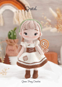 Crochet pattern for a baby girl doll wearing a scarf and a dress