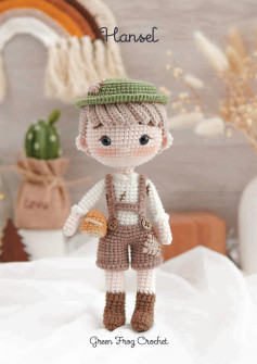 crochet pattern for baby boy doll wearing hat and overalls