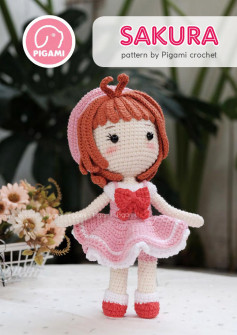 Crochet pattern for sakura doll wearing a pink dress