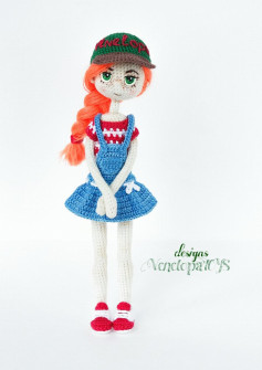 Crochet pattern for a girl doll wearing a flared overalls, a cap, and braided hair