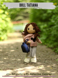 DOLL TATIANA crochet pattern, The doll wears a pink shirt and carries a backpack