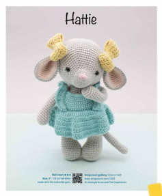 Hattie Crochet pattern of a mouse wearing a blue dress and yellow bow