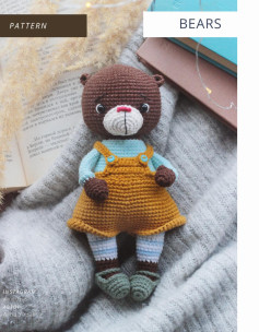 Crochet pattern brown bear wearing orange dress