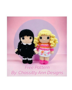 Crochet pattern for a doll wearing a black dress and a doll wearing a pink dress and blonde hair.