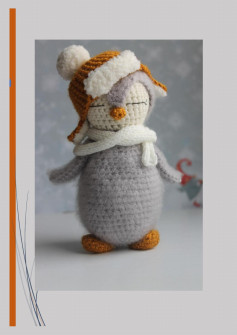 Crochet pattern of a penguin wearing a hat and scarf