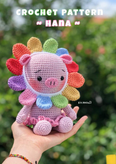 Crochet pattern of a pig wearing a wreath